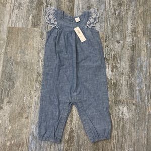 Denim romper with shoulder detail